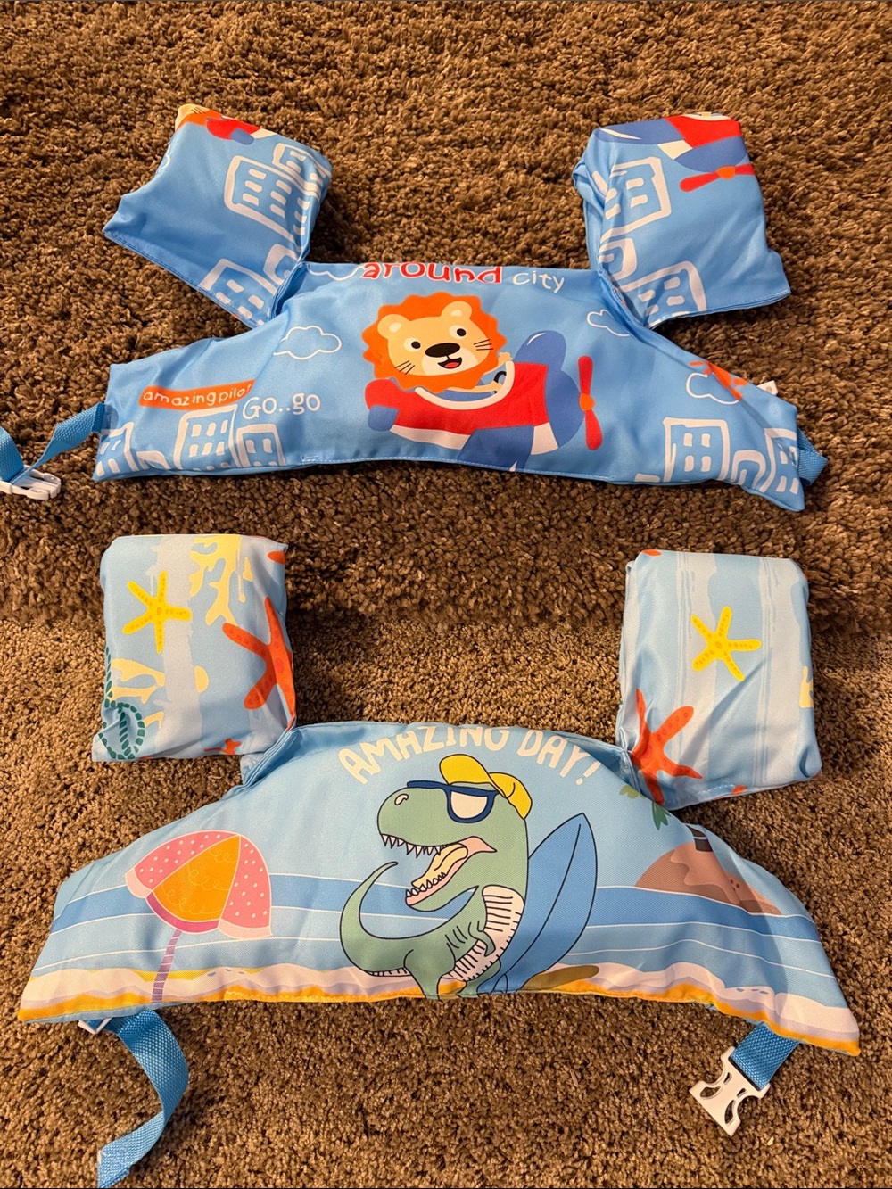 Set of 2. New Kids Blue Swim Vest Set with Dino & Lion Graphics.  30-55 lbs